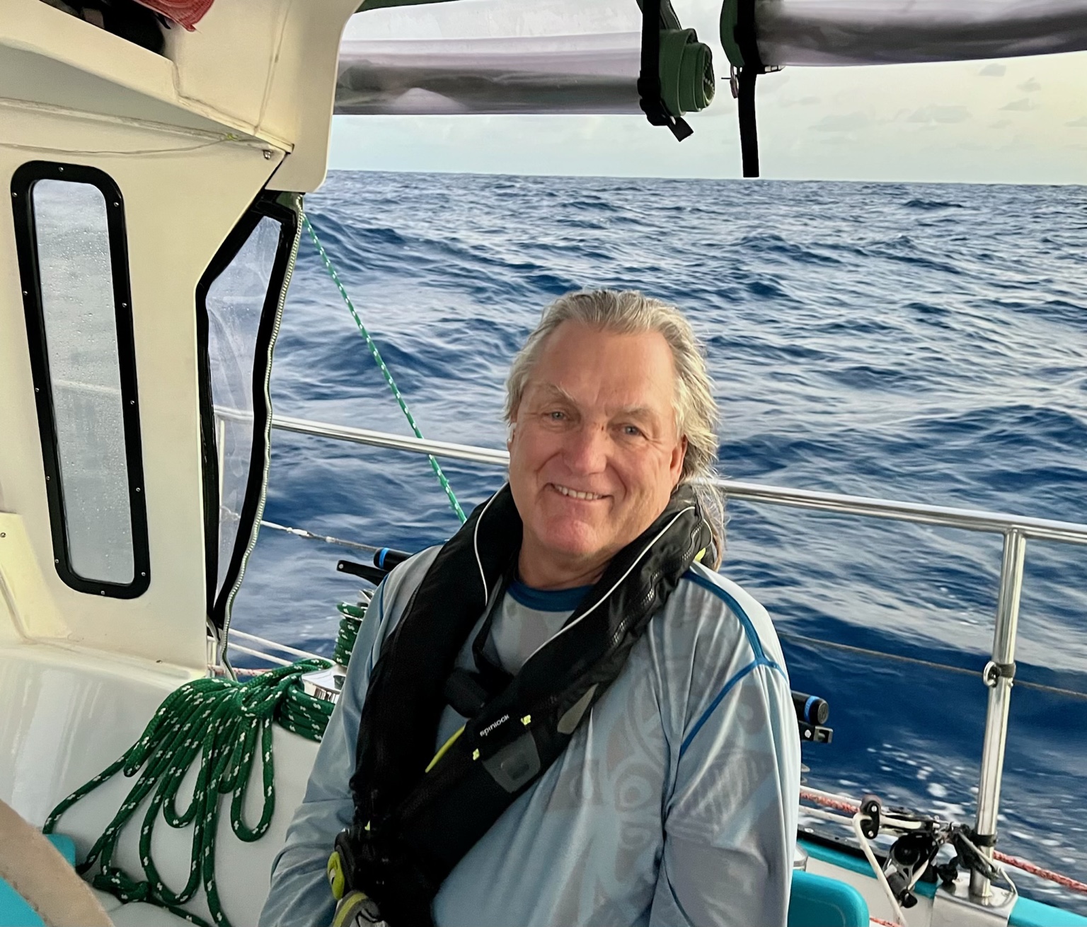 Christian Holm aboard Mālama Kai at sea
