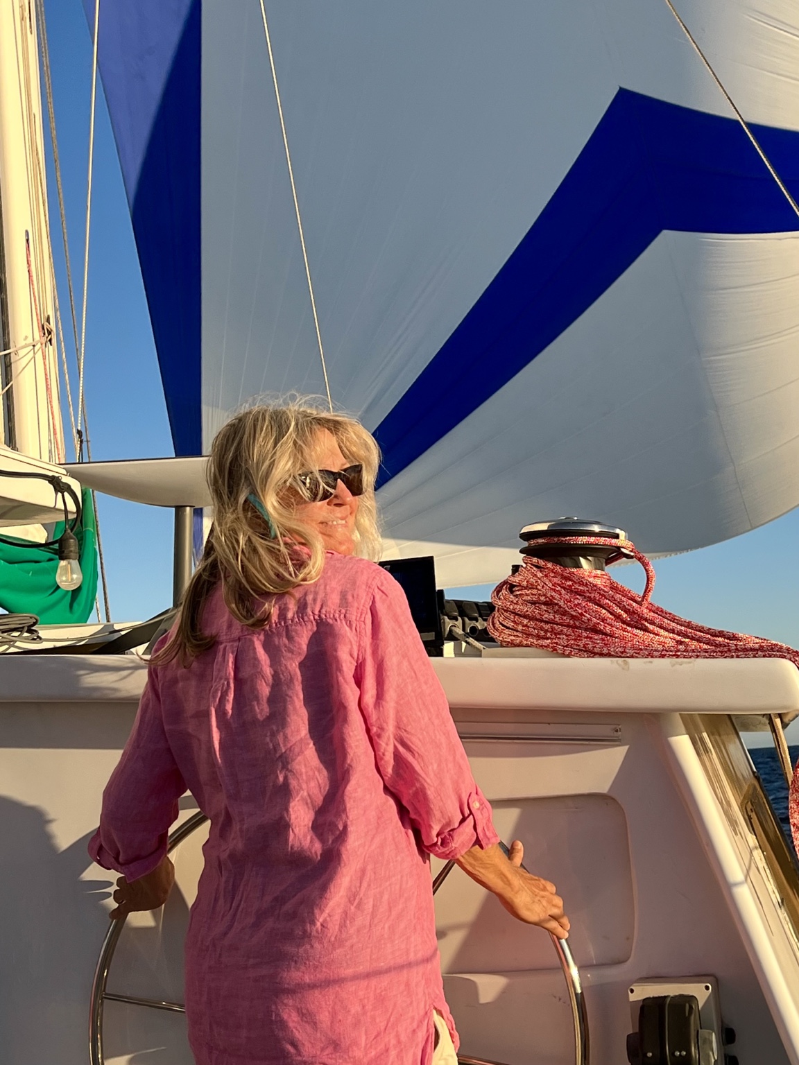Lynn Swycaffer Ringseis at the helm under sail